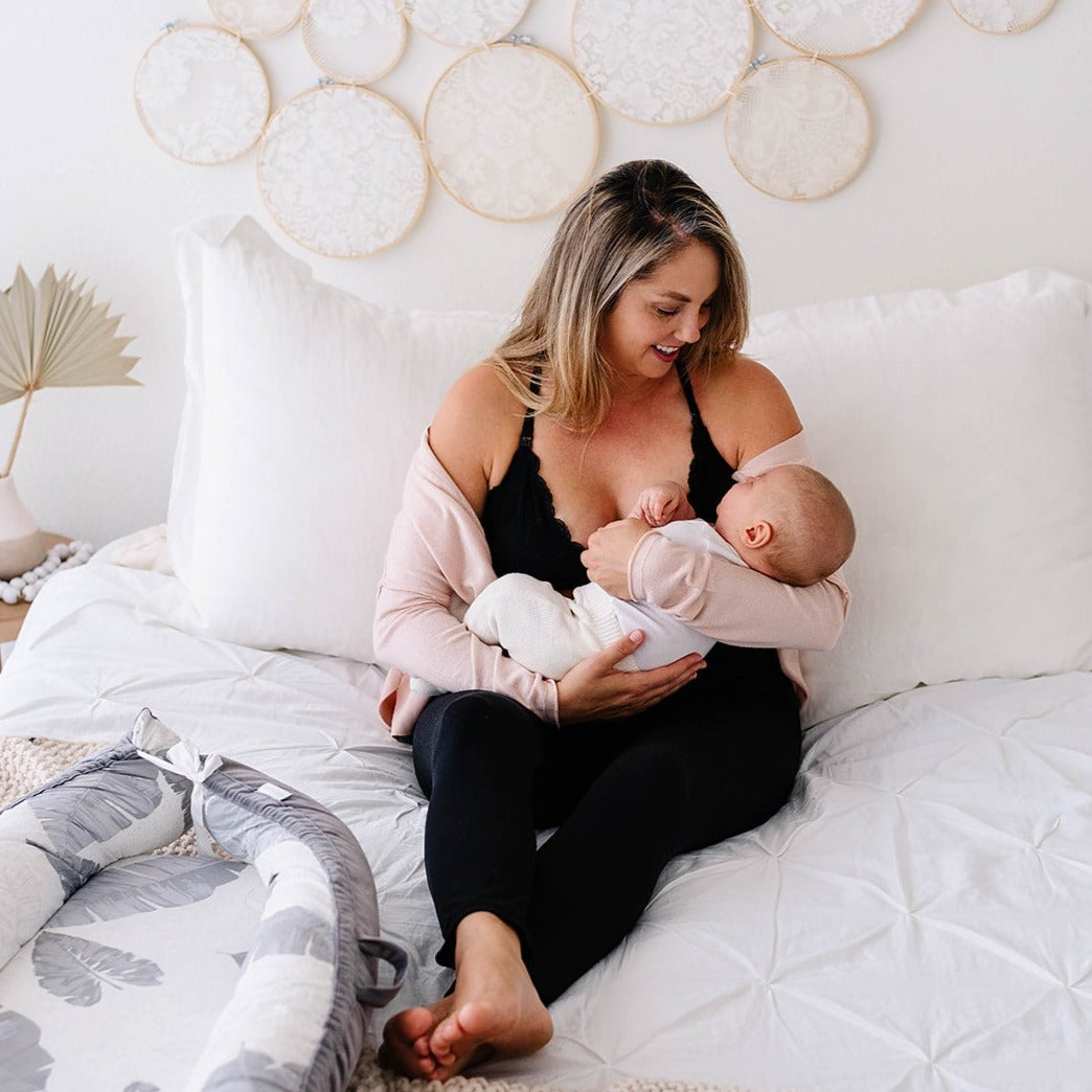 happy baby nursing breastfeeding mom oh la lari black bra and legging