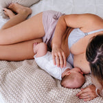 nursing baby in oh la lari nursing bralette